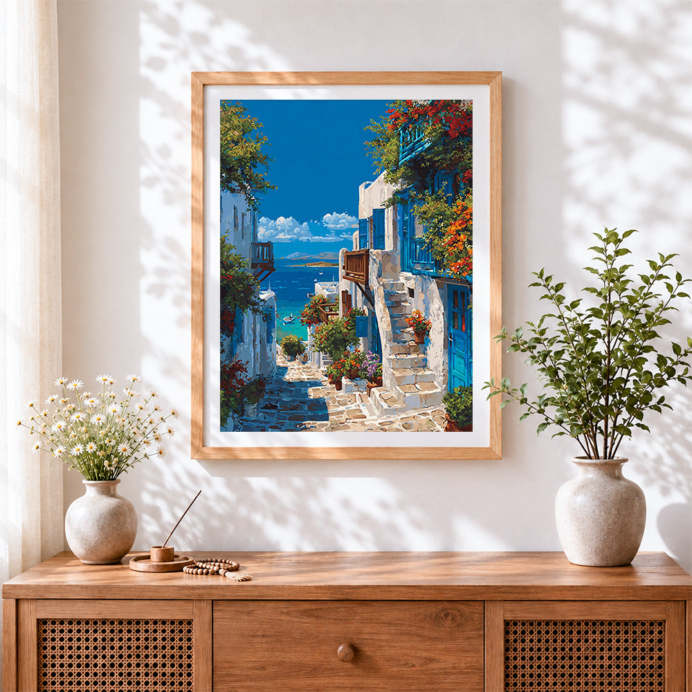 Finished santorini blue and white alleyway cross stitch artwork displayed