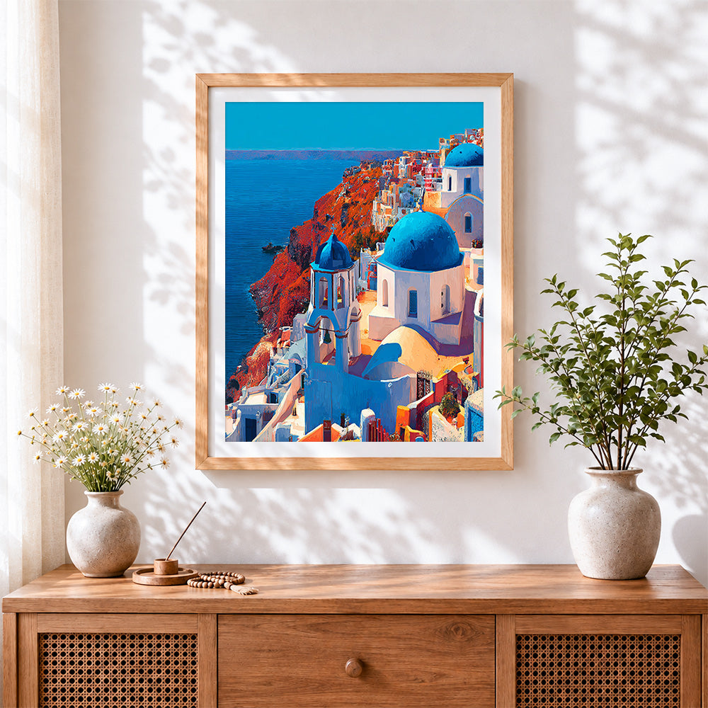 Finished santorini blue domes and cliffs cross stitch artwork displayed