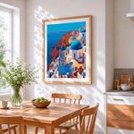 Santorini blue domes and cliffs cross stitch artwork displayed on wall as home decor