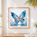 Finished sapphire crystal butterfly cross stitch artwork displayed