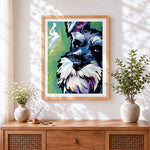 Finished schnauzer portrait cross stitch artwork displayed