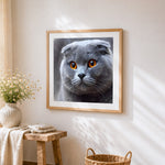 Scottish fold cat close-up cross stitch artwork displayed on wall as home decor