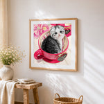 Scottish fold kitten in red teacup cross stitch artwork displayed on wall as home decor