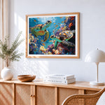 Sea turtles and tropical fish cross stitch artwork displayed on wall as home decor