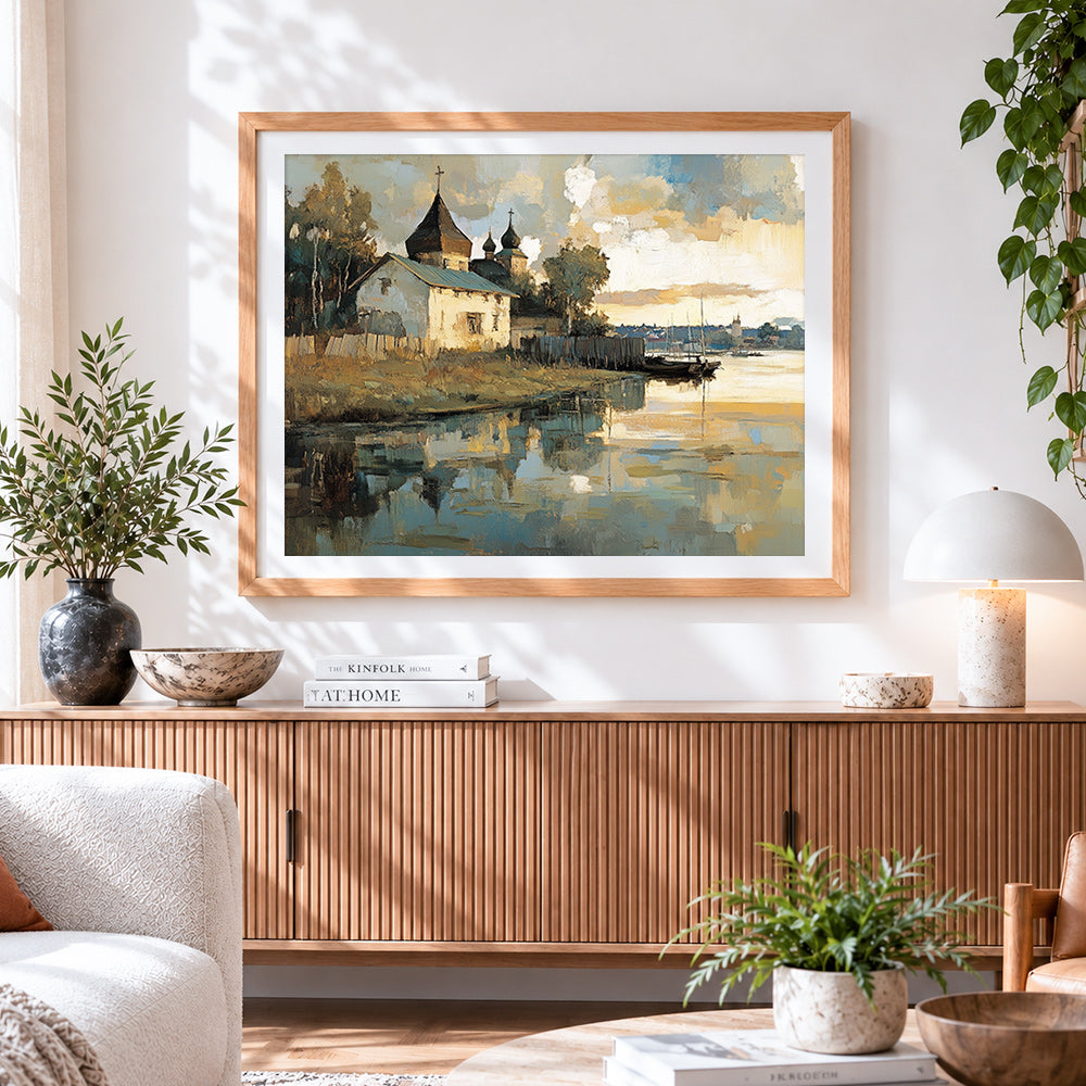 Finished seaside church and reflection cross stitch artwork displayed