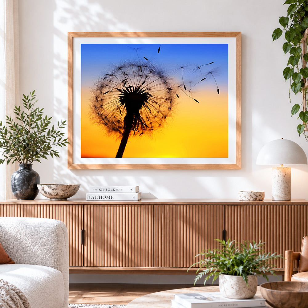Finished seeds blowing in the wind cross stitch artwork displayed