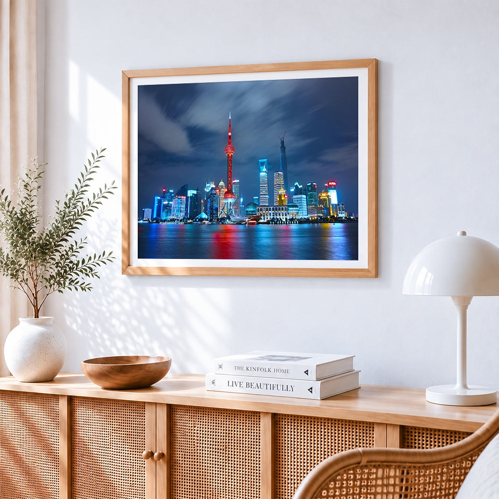 Shanghai skyline at night cross stitch artwork displayed on wall as home decor