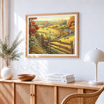 Sheep grazing on autumn hills cross stitch artwork displayed on wall as home decor