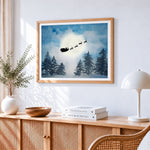 Silhouette of santa s sleigh flying past the moon cross stitch artwork displayed on wall as home decor