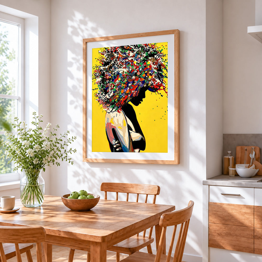 Silhouette with colourful afro hair cross stitch artwork displayed on wall as home decor