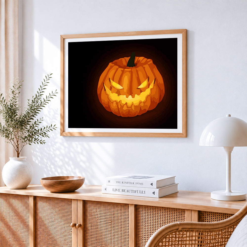 Sinister glowing jack o lantern cross stitch artwork displayed on wall as home decor