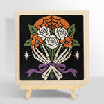 Skeleton hands holding roses punch needle kit for beginners