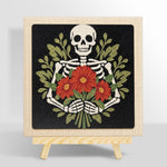Skeleton holding red blooms punch needle kit for beginners