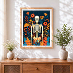 Finished skeleton in a wildflower garden cross stitch artwork displayed