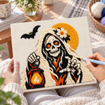 Creating handmade skeleton spirit holding lantern punch needle artwork