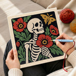 Creating handmade skeleton with poppies and butterfly punch needle artwork