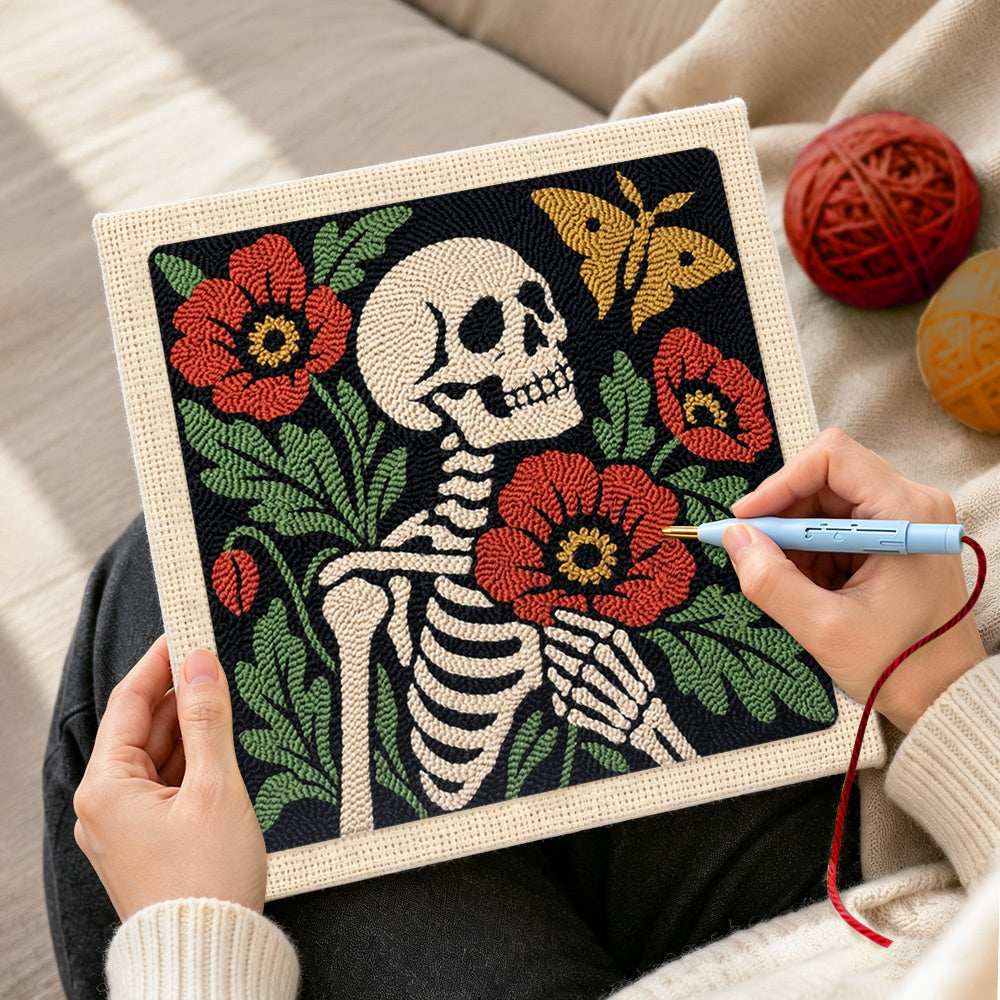 Creating handmade skeleton with poppies and butterfly punch needle artwork
