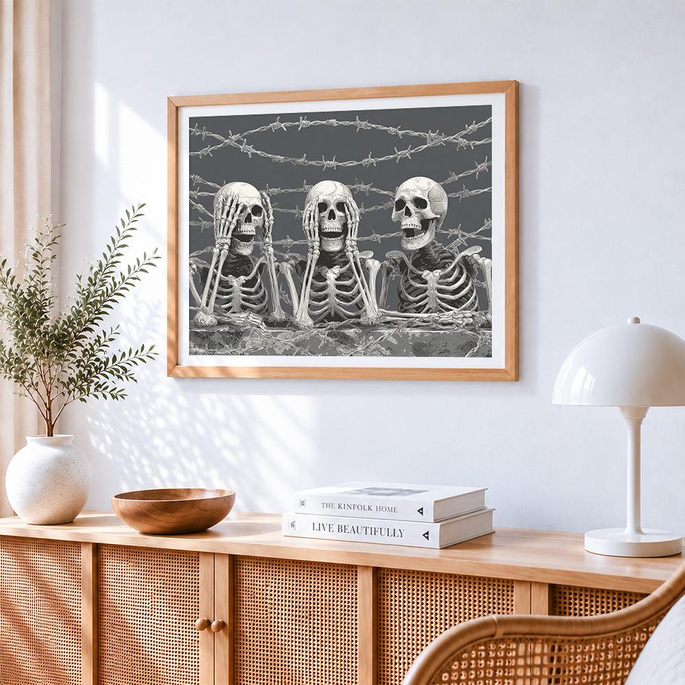 Skeletons behind barbed wire cross stitch artwork displayed on wall as home decor
