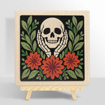 Skull cupping cheeks with autumn blooms punch needle kit for beginners