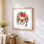 Skull with diamond eyes cross stitch artwork displayed on wall as home decor