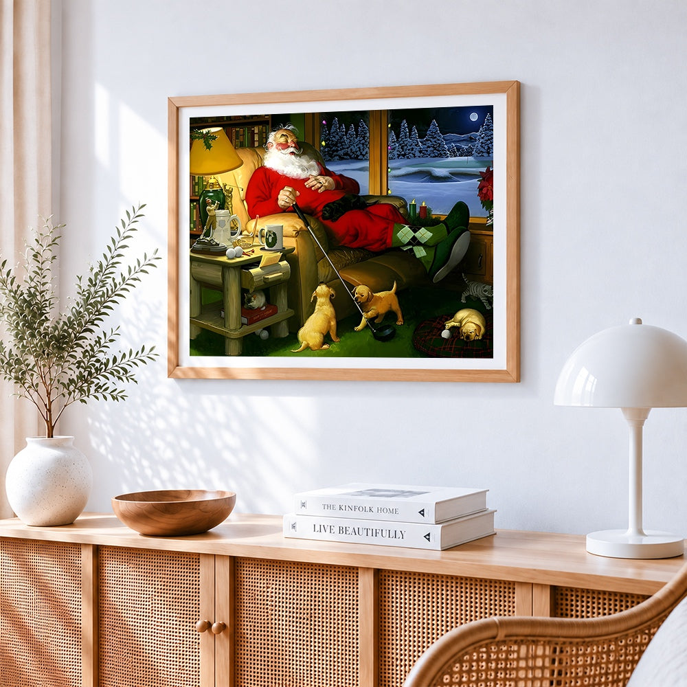 Sleeping father christmas with golf club cross stitch artwork displayed on wall as home decor