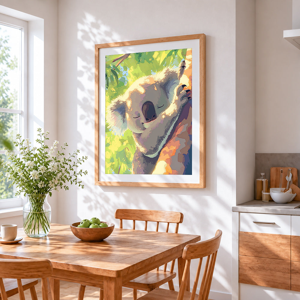 Sleeping koala in tree cross stitch artwork displayed on wall as home decor