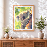 Finished sleeping koala in tree paint by numbers artwork displayed as home decor