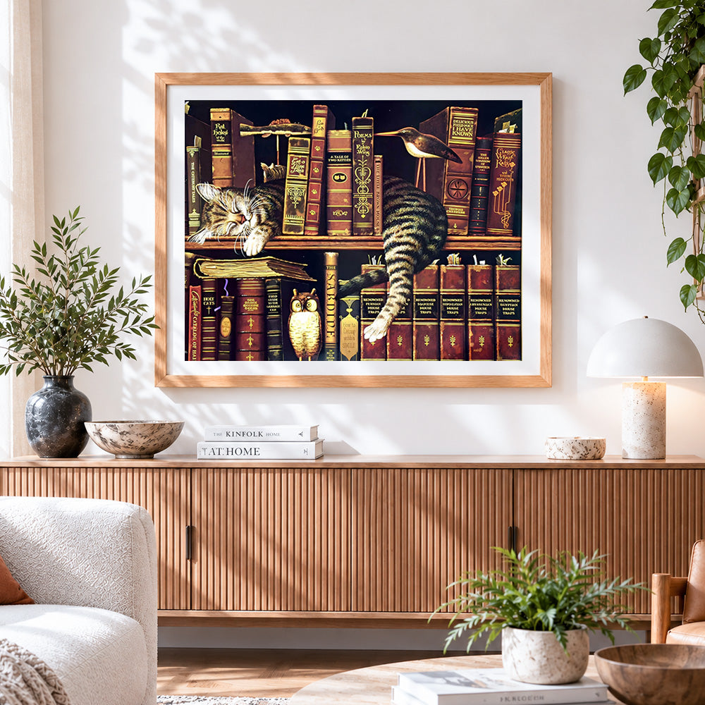 Finished sleeping tabby cat on bookshelf cross stitch artwork displayed