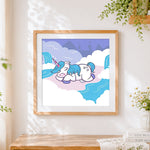 Finished sleeping unicorn in the clouds cross stitch artwork displayed