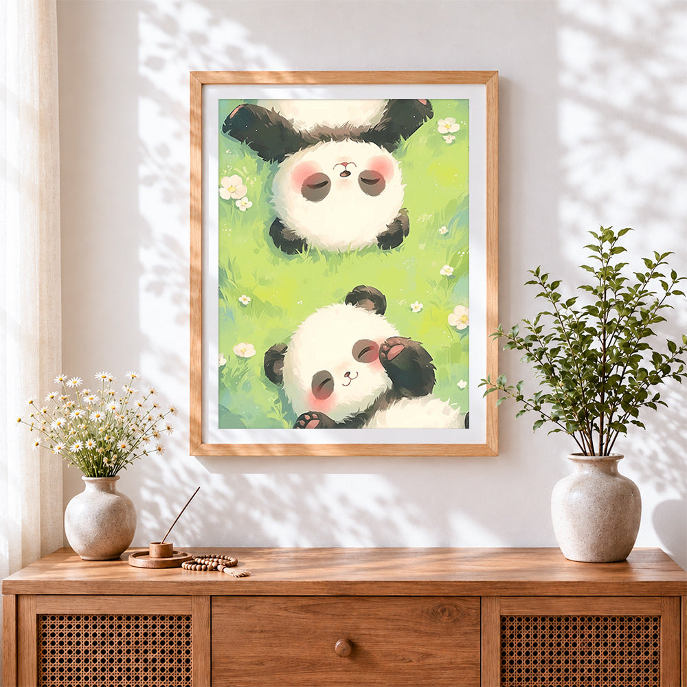 Finished sleepy pandas in the grass cross stitch artwork displayed