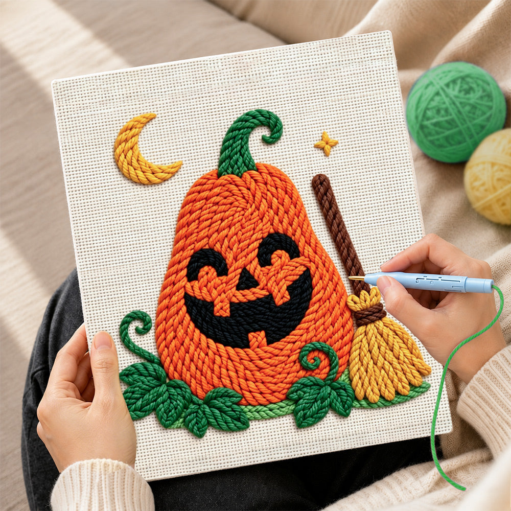 Creating handmade smiling pumpkin with broom punch needle artwork