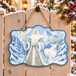 Snow forest santa scene paint by numbers door hanger on a garden gate
