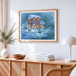 Snowman and cosy cottage cross stitch artwork displayed on wall as home decor