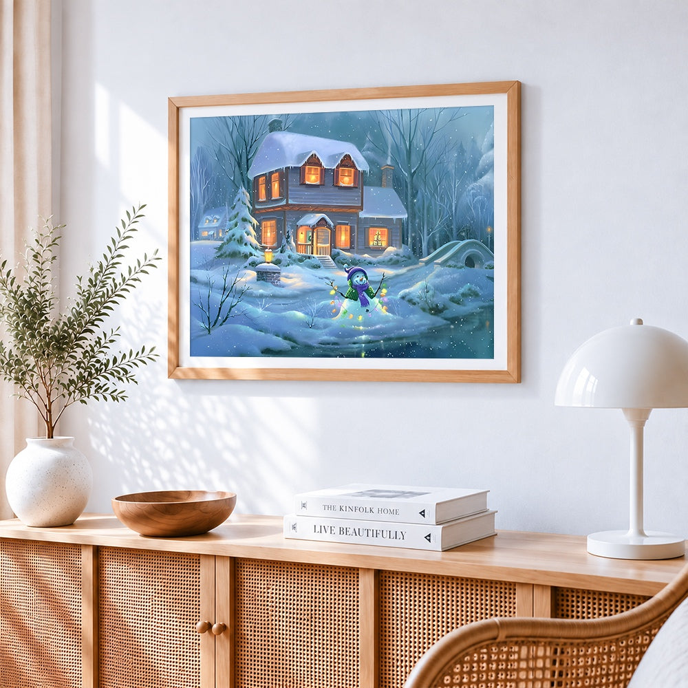 Snowman and cosy cottage cross stitch artwork displayed on wall as home decor