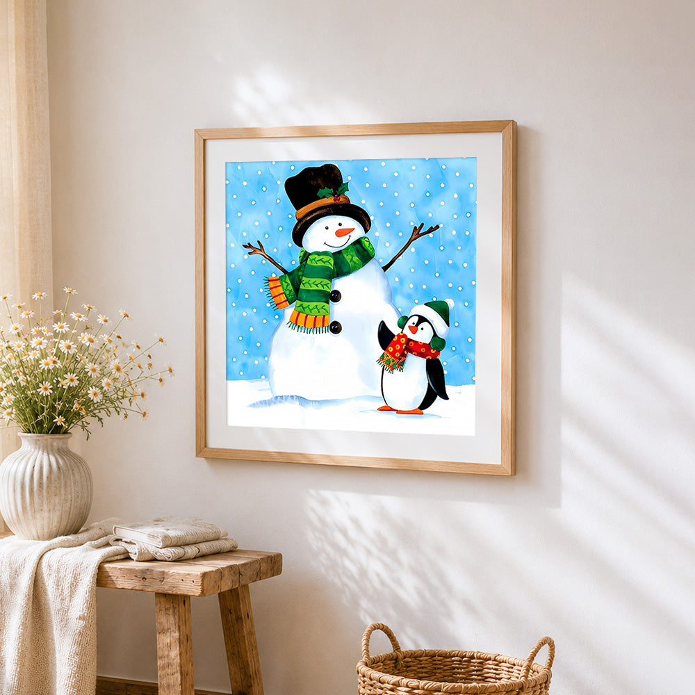 Snowman and penguin in the snow cross stitch artwork displayed on wall as home decor