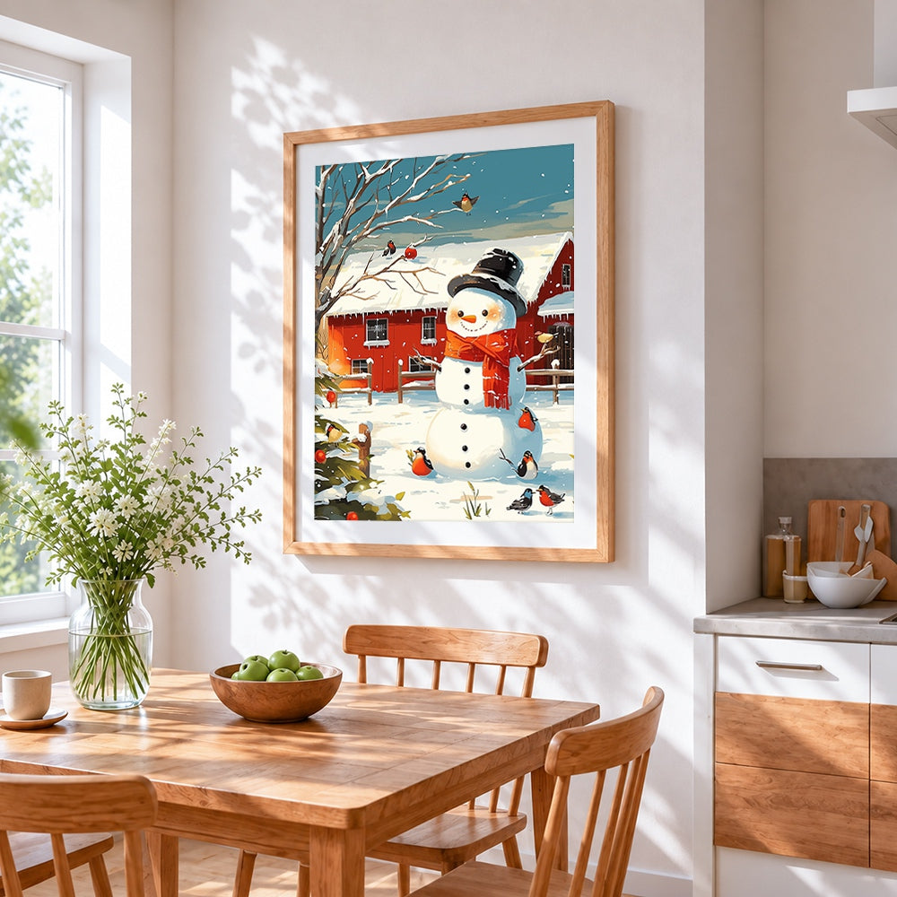 Snowman and robins by red barn cross stitch artwork displayed on wall as home decor