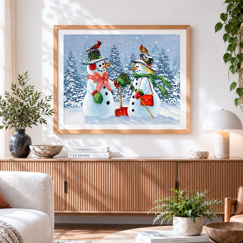 Finished snowman couple with red birds paint by numbers artwork displayed as home decor