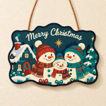 Snowman family with cosy cottage paint by numbers door hanger finished design