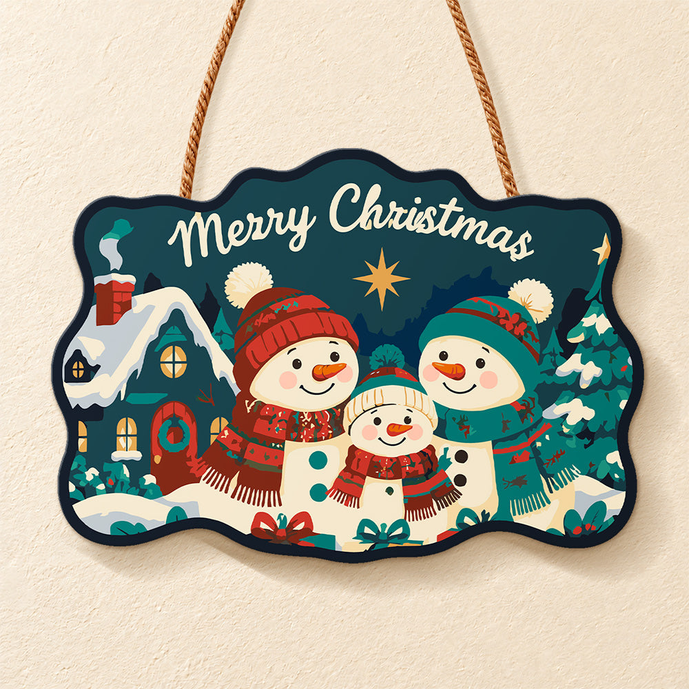 Snowman family with cosy cottage paint by numbers door hanger finished design