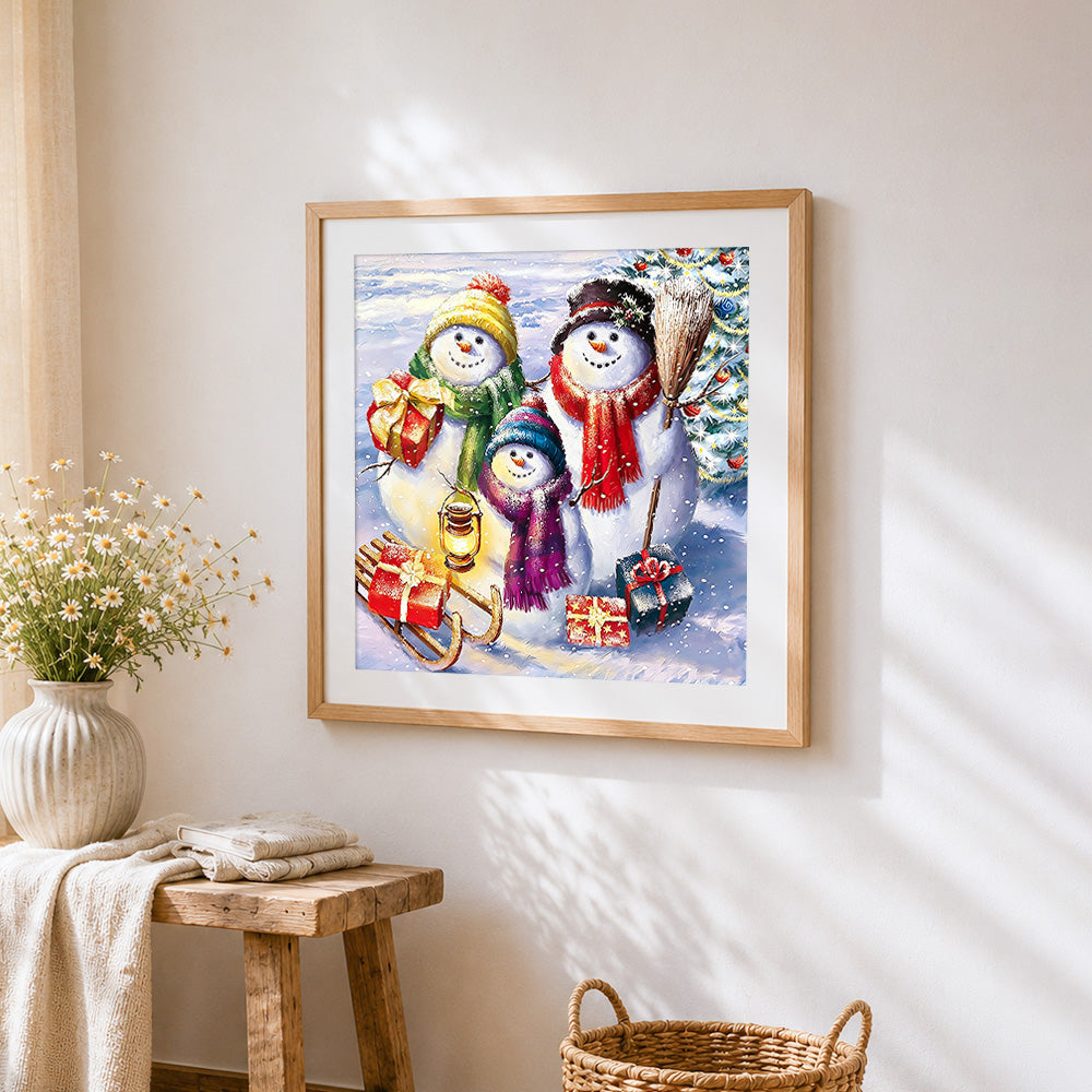 Snowman family with gifts and sleigh paint by numbers artwork displayed on wall as home decor