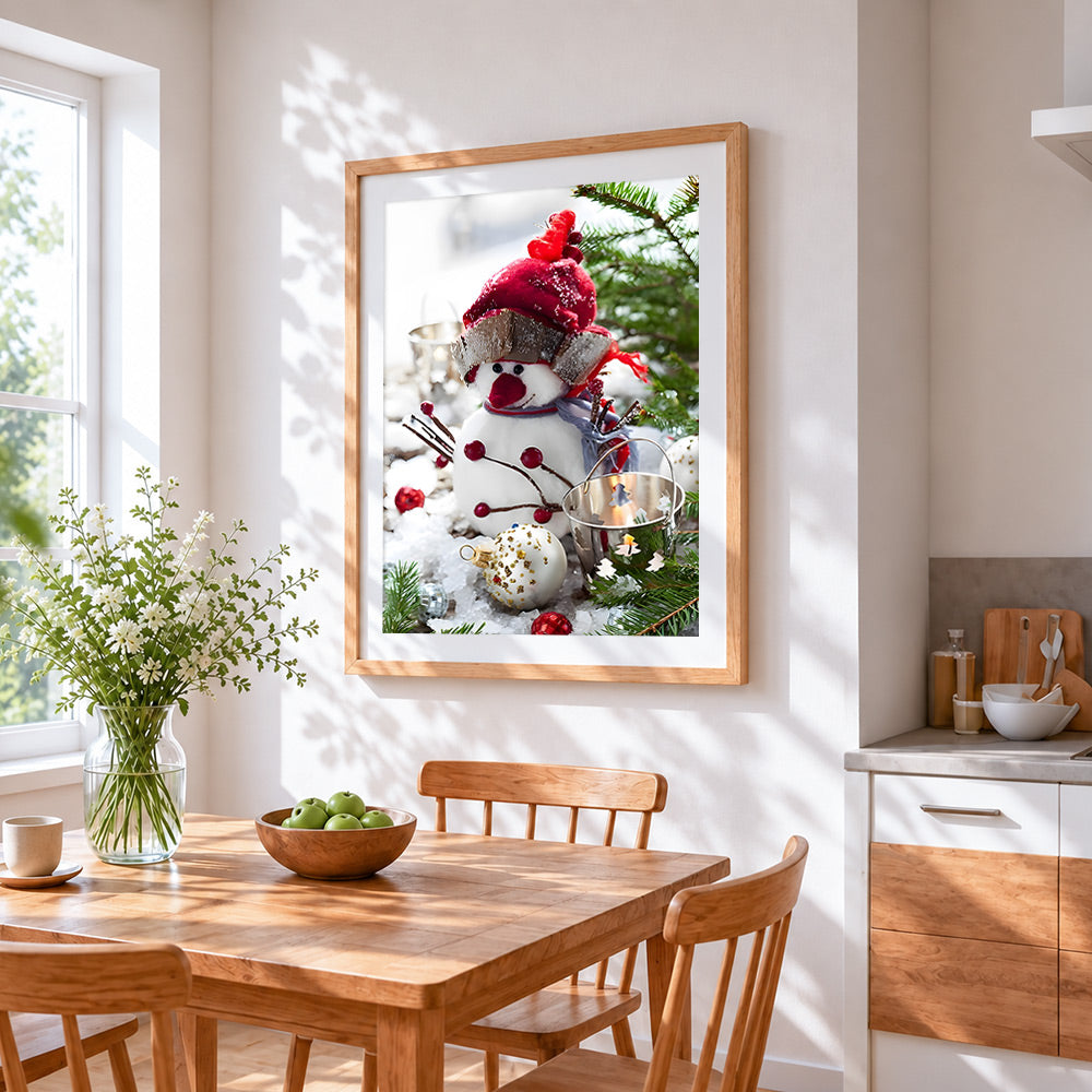 Snowman figurine and christmas baubles cross stitch artwork displayed on wall as home decor