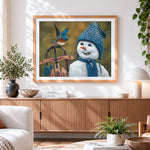 Finished snowman in blue knitted hat with little bird paint by numbers artwork displayed as home decor