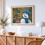 Snowman in blue knitted hat with little bird paint by numbers artwork displayed on wall as home decor