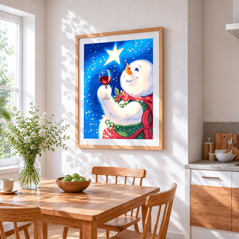 Snowman toasting with a glass of red wine cross stitch artwork displayed on wall as home decor