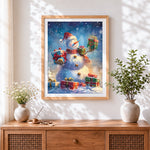 Finished snowman with christmas presents cross stitch artwork displayed