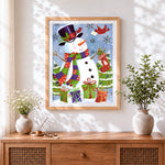Finished snowman with christmas stockings and presents cross stitch artwork displayed