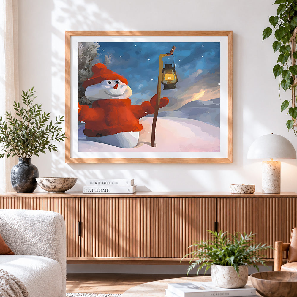 Finished snowman with lantern cross stitch artwork displayed
