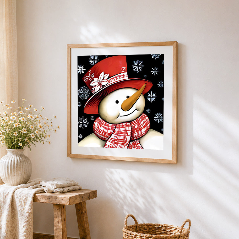 Snowman with red hat and snowflakes cross stitch artwork displayed on wall as home decor