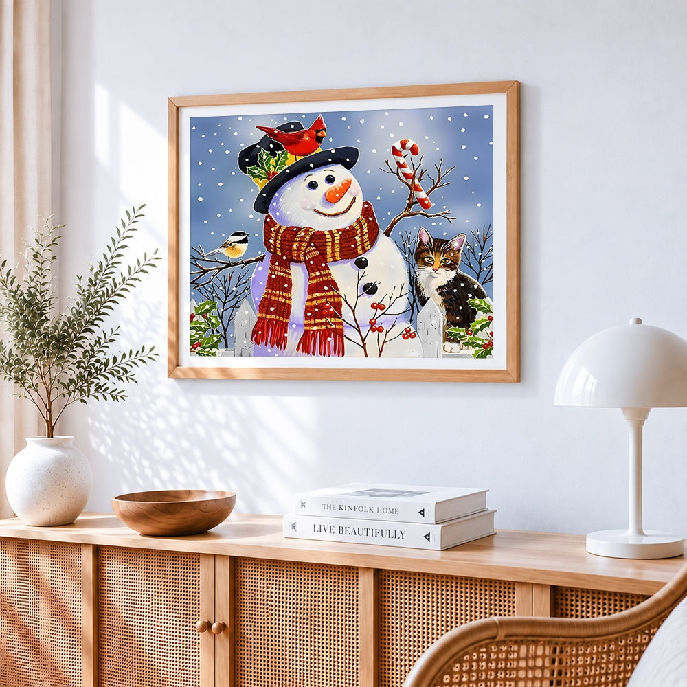 Snowman with robin and cat cross stitch artwork displayed on wall as home decor