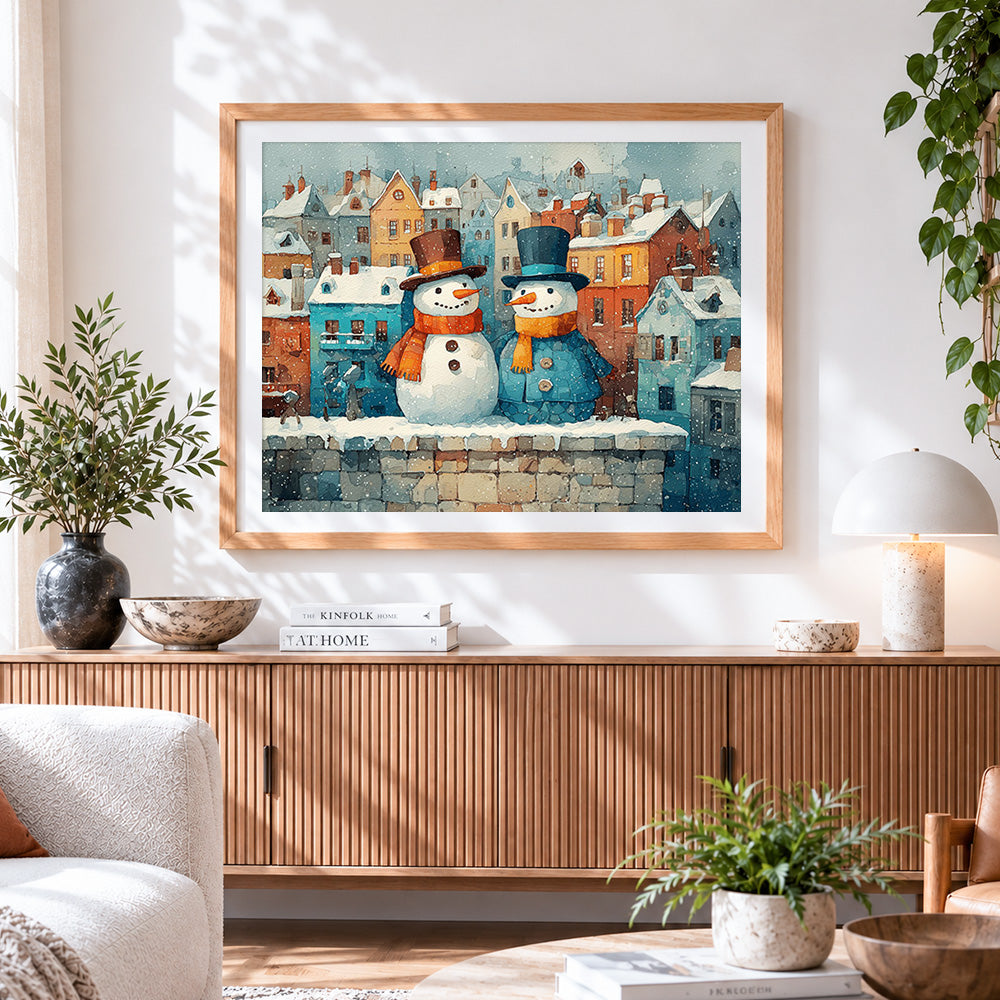 Finished snowmen in snowy town cross stitch artwork displayed